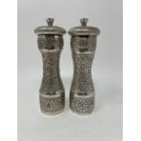 A pair of Indian silver pepper grinders, 17 cm high (2) Age second half 20th century Working See