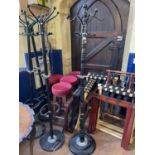 Four coat stands, four bar stools, and various luggage stands (qty)