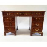 A mahogany pedestal desk, 120 cm wide