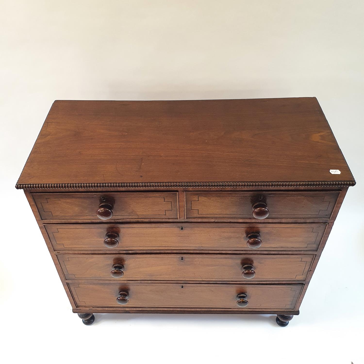 A 19th century mahogany chest, having two short and three long drawers on turned feet, 107 cm wide - Image 6 of 9