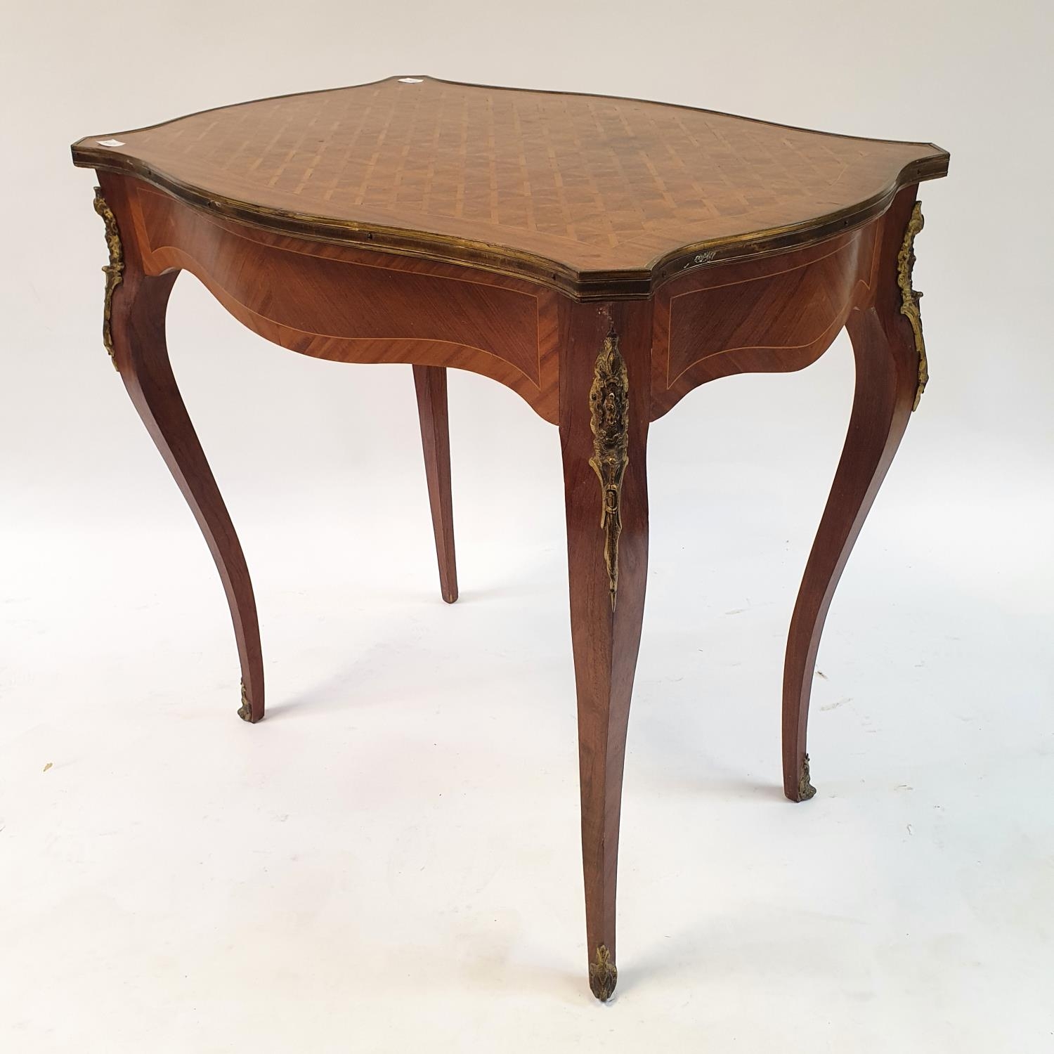 A 20th century French rosewood serpentine side table with parquetry inlay, having a single frieze - Image 4 of 4