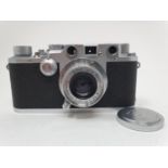 A Leica IIIc camera, serial number 369186, with leather outer case