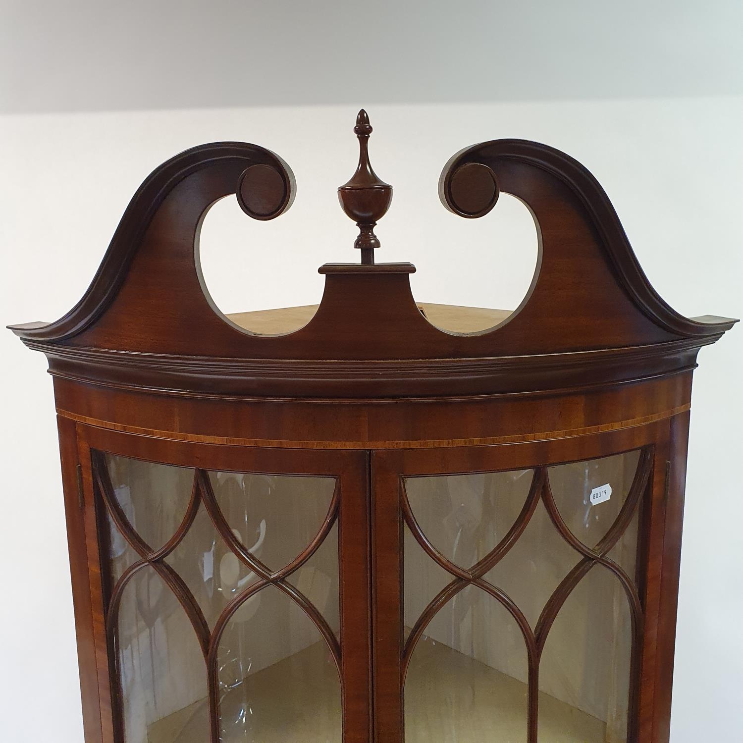 A George III style mahogany bow front free standing corner cupboard, with two glazed doors, above - Image 3 of 4