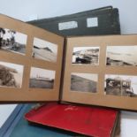 A mid 20th century photograph album mostly alpine scenes and three other photograph albums (4)