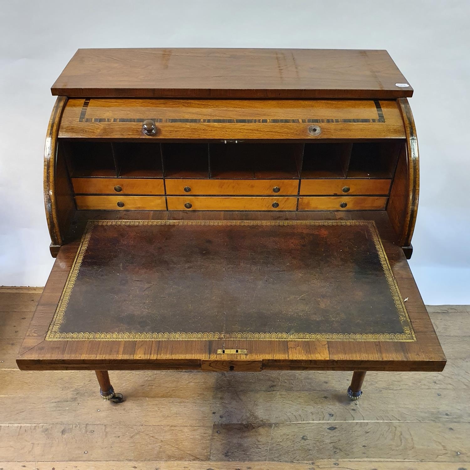 A late 19th century rosewood cylinder bureau, with a fitted interior, above two drawers, on turned - Image 3 of 6