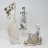 A Lladro figure, of a girl with a goose, 26 cm high, another of a girl with a dove, 19 cm high and a