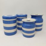 A T G Green Cornishware blue and white storage jar, and five others, three character jugs and