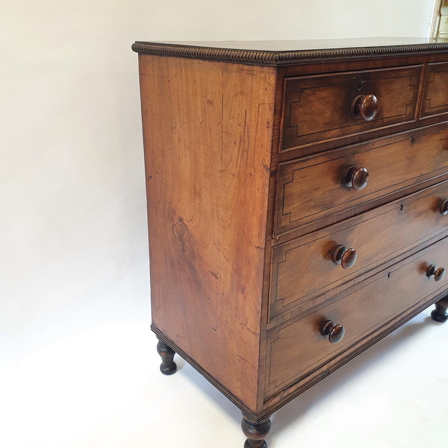 A 19th century mahogany chest, having two short and three long drawers on turned feet, 107 cm wide - Image 4 of 9