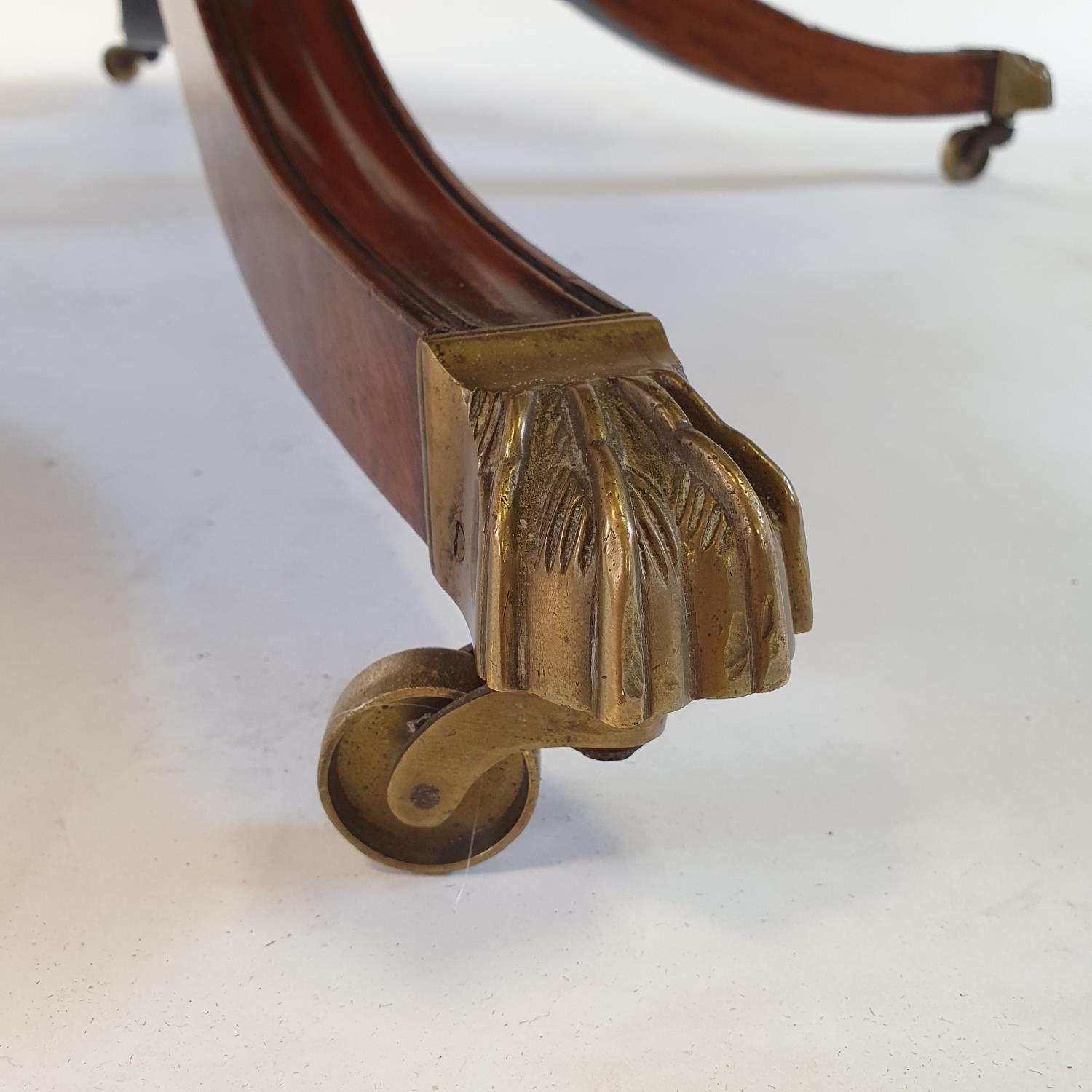 A George III style mahogany drum top table, the leather inset top above four real and four false - Image 4 of 7