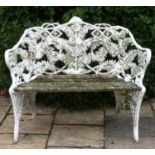 A Coalbrookdale style cast iron fern pattern bench, 116 cm wide Very weathered and slats need