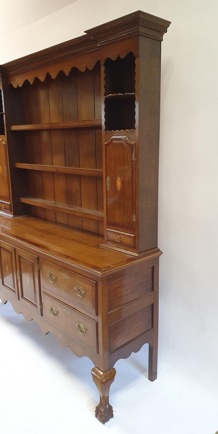An 18th century style oak dresser, the top with shelves, two cupboard doors and two drawers, the - Image 5 of 8