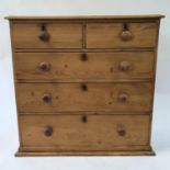A pine chest, having two short and three long drawers, 98 cm wide