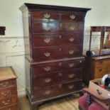 A 19th century mahogany chest on chest, the top having two short and three long drawers on a base