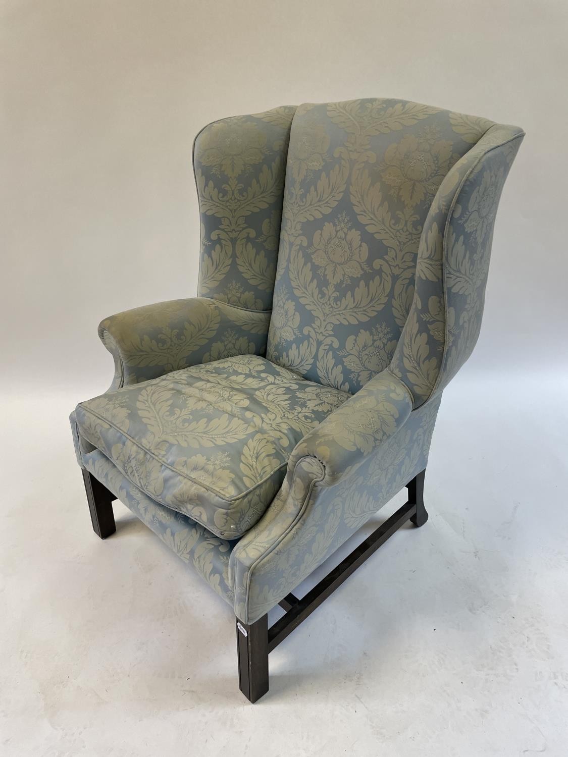 A George III style wing armchair