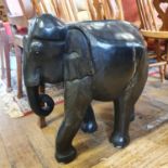 A large carved ebony elephant, 56 cm high