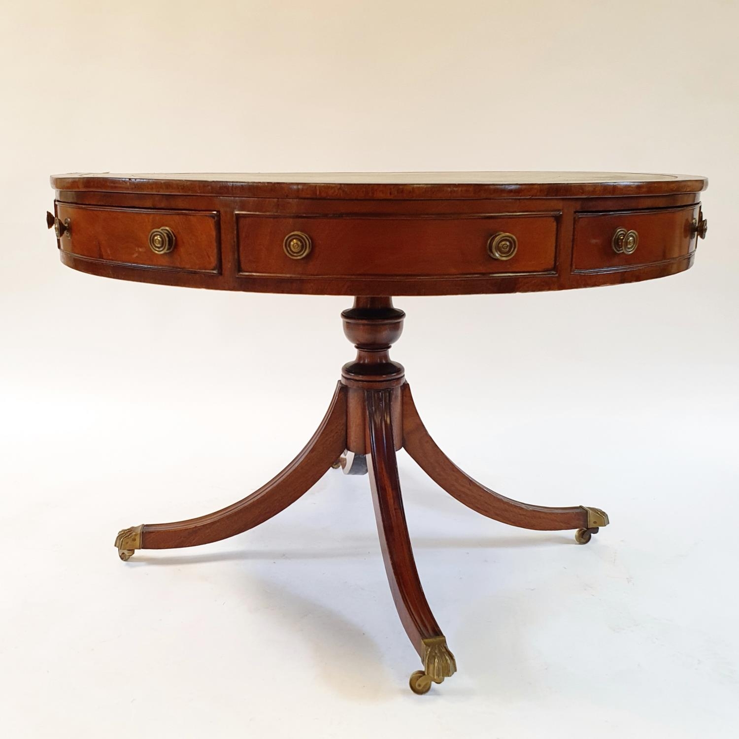 A George III style mahogany drum top table, the leather inset top above four real and four false - Image 2 of 7