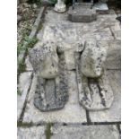 A pair of composite stone garden statues, in the form of grey hounds, 66 cm wide