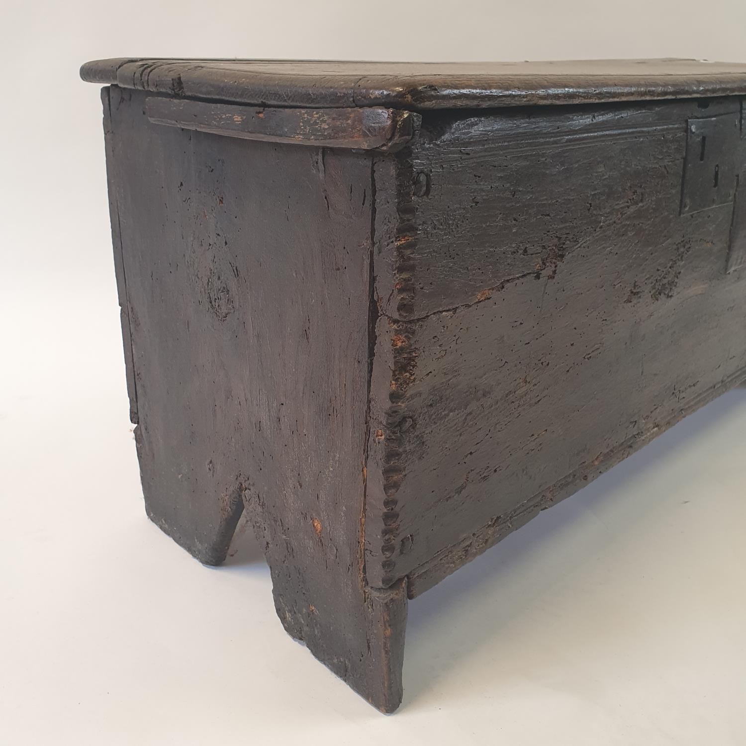 An 18th century oak coffer, 95 cm wide Top split, two large repairs, replaced hinges, various - Image 4 of 7