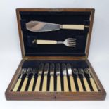 A silver plated fish service, in a mahogany case, and other items