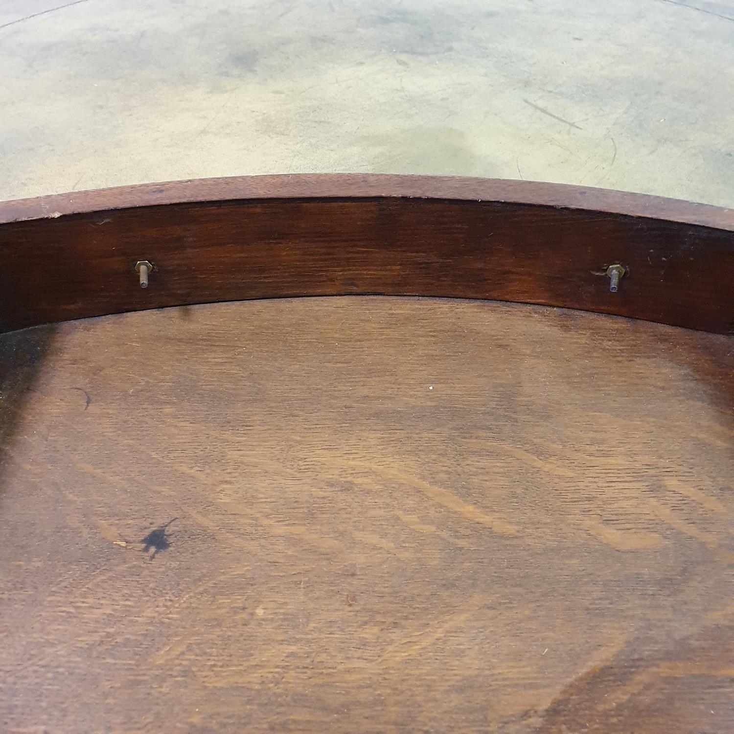 A George III style mahogany drum top table, the leather inset top above four real and four false - Image 6 of 7