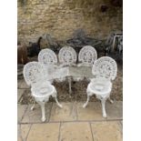 A 19th century style painted cast metal garden bench, 133 cm wide and two matching chairs (3)