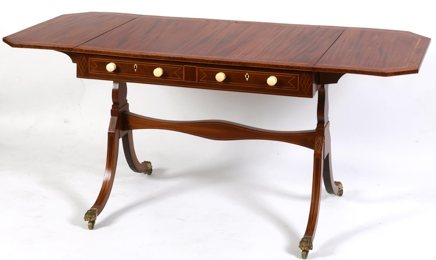 A 19th century mahogany sofa table, the top with satinwood and rosewood crossbanding, boxwood and