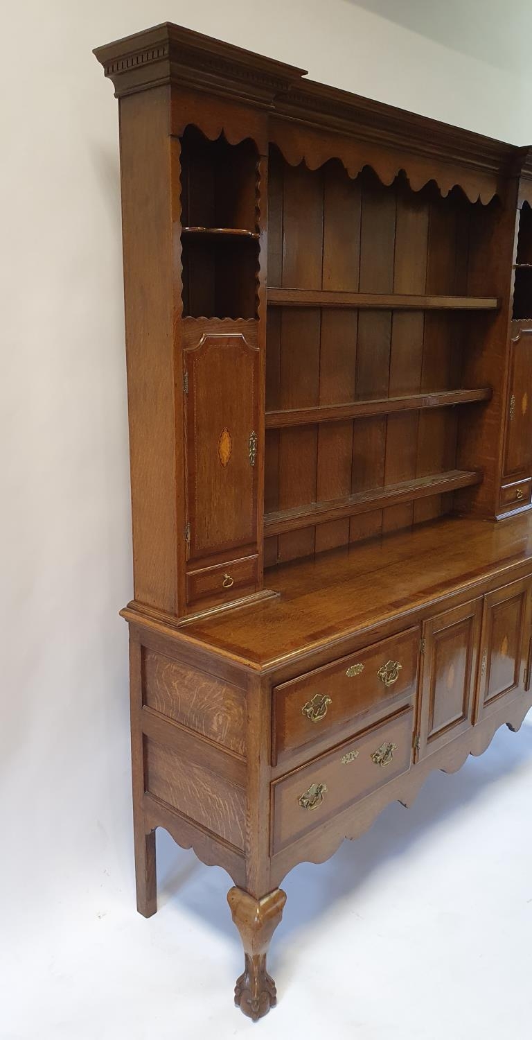 An 18th century style oak dresser, the top with shelves, two cupboard doors and two drawers, the - Image 4 of 8