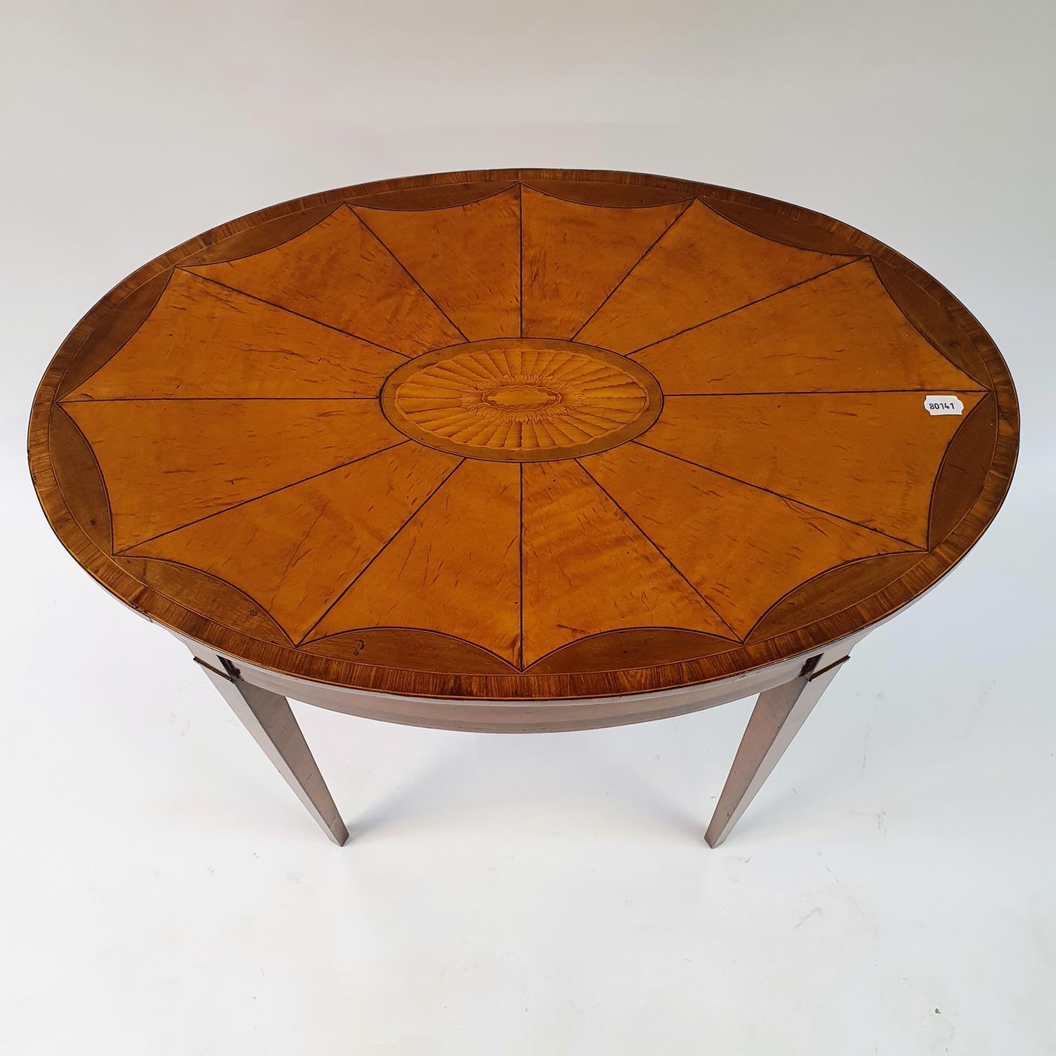 An oval table, veneered in satinwood and crossbanded in rosewood, on square tapering legs, 83 cm - Image 4 of 4