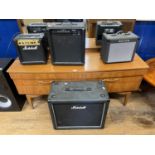 A Marshall guitar amp, and three others (4)