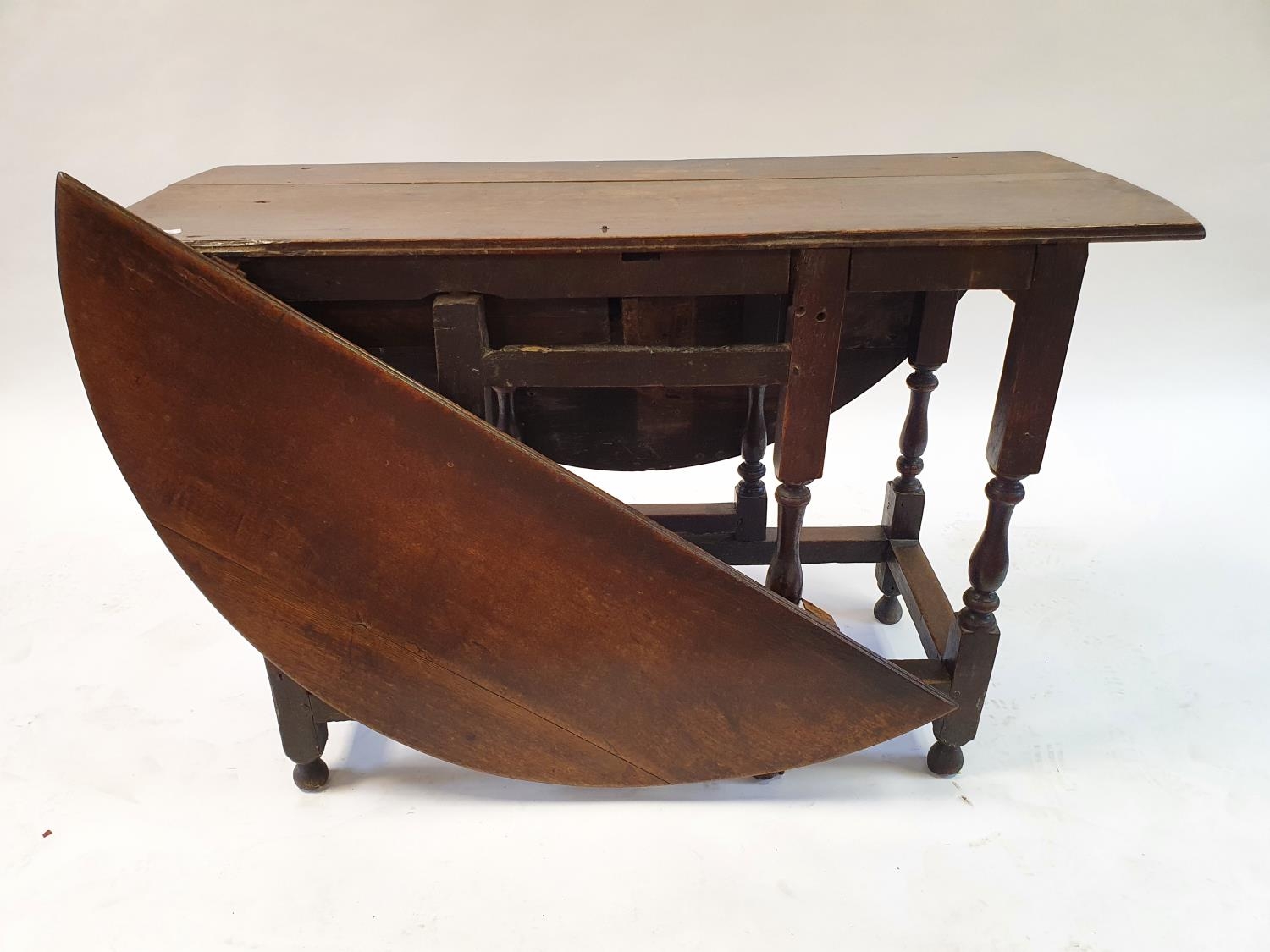 An 18th century oak gateleg table, 114 cm wide, and a walnut lamp table, 67 cm wide and a dressing - Image 5 of 7