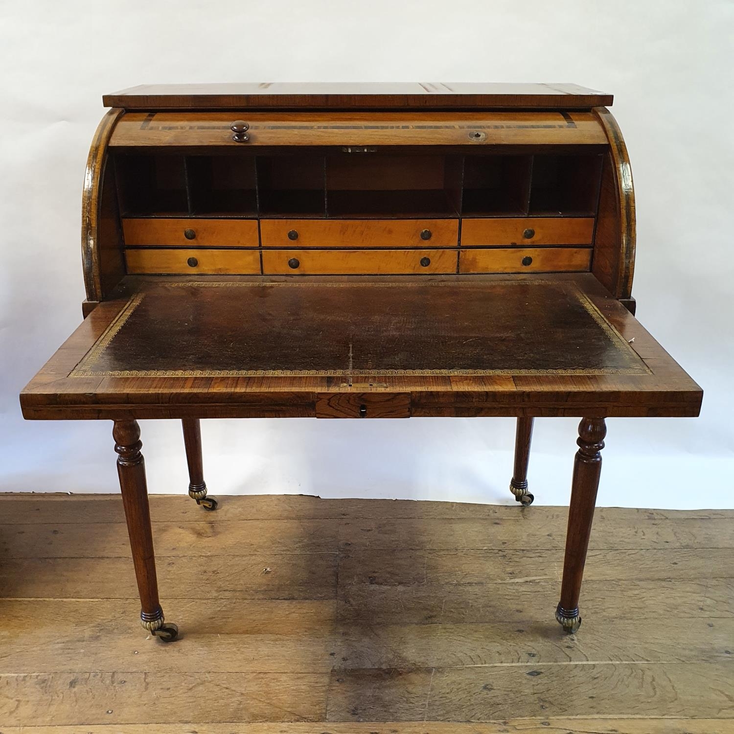 A late 19th century rosewood cylinder bureau, with a fitted interior, above two drawers, on turned - Image 2 of 6