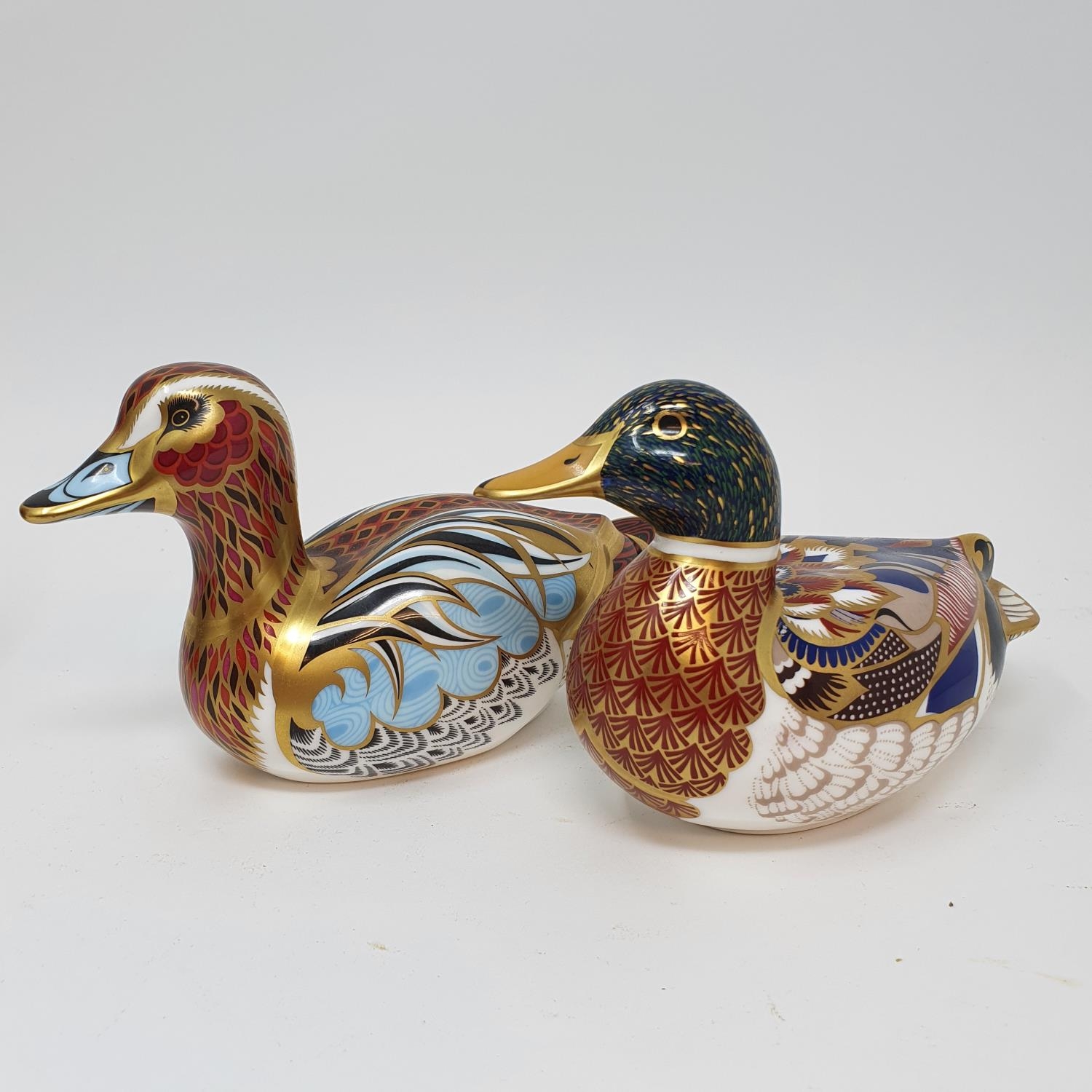 A Royal Crown Derby paperweight, in the from of a duck, its pair, a Royal Doulton Flambe vase and - Image 3 of 9