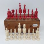 An early 20th century carved ivory chess set, the king 9 cm high Various small losses throughout