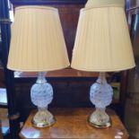 A pair of moulded glass table lamps, with silk shades, 78 cm high (2)