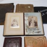 An early 20th century photograph/scrap album, four other photograph albums, and an album of