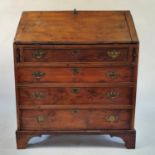 A 19th century yew bureau, the fall front with a fitted interior, above four drawers, 90 cm wide