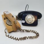 A Bakelite dial telephone, A515, a beige Trim Phone, a limited edition compact navy blue Silver