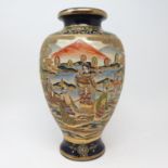 A Japanese vase, decorated figures, 31 cm high