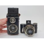 A Kamera Werkstattn Guthe & Dhrosch Pilot camera, and a Deschel-Manschen Compur camera (2)