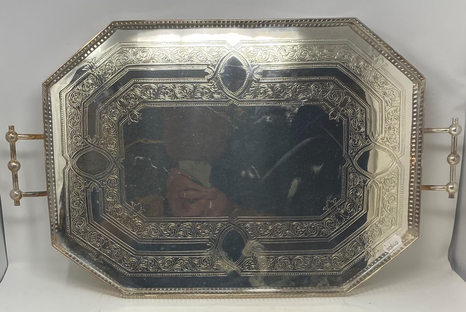 A silver plated two handled tray, with a gallery, 68 cm wide