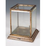 A George V silver and glass table top display cabinet, London 1914, 14 cm high, 12 cm wide Top piece