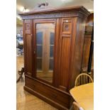 A walnut wardrobe, 130 cm wide