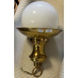 A brass ceiling light, with an opaque glass shade, 30 cm diameter