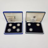 Eight £1 silver proof coins, 1983-1987, and 1994-1996, with three certificates in two boxes (2)