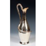 A silver plated wine jug, with a snake handle, 36 cm high