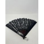 A tortoiseshell and lace fan, 40 cm, in original box Probably 1920s box in poor condition