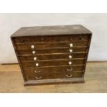 A 19th century pine tool chest, having four short drawers, above six long drawers, 105 cm wide