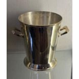 A silver plated champagne bucket, 22 cm high