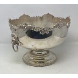 A silver plated punch bowl, with lions head ring handles, 32 cm diameter