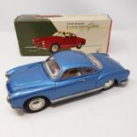 An ATC model of a Volkswagen Karmann Ghia, blue, boxed